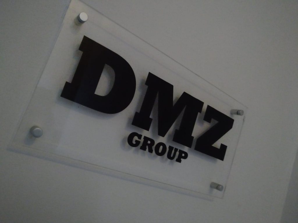 DMZ Group UK office wall sign